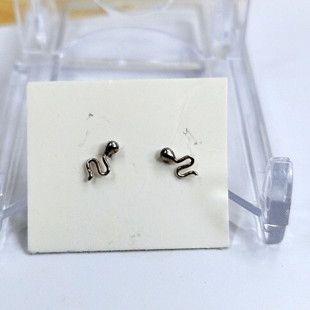 Silver tone squiggly earrings